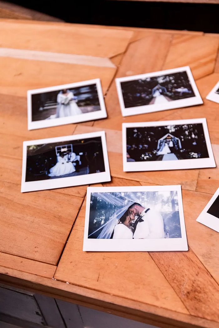 The Polaroid prints Paola hands couples at the end of the wedding night